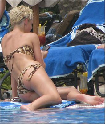 Sarah Harding by the pool