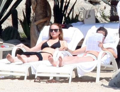 Lindsay Lohan is sunbathing