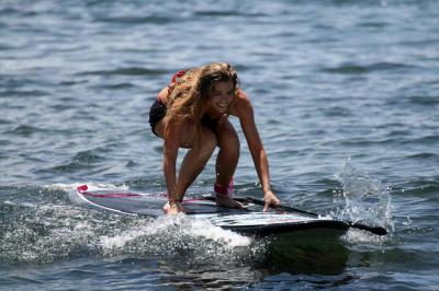 Denise Richards surfing