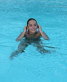 Alizee swimming