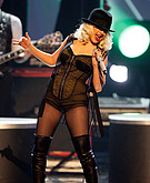 Christina Aguilera wearing black hat