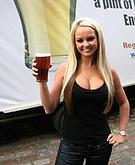 Jennifer Ellison poses with beer