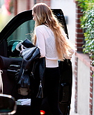 Lindsay Lohan getting in a car